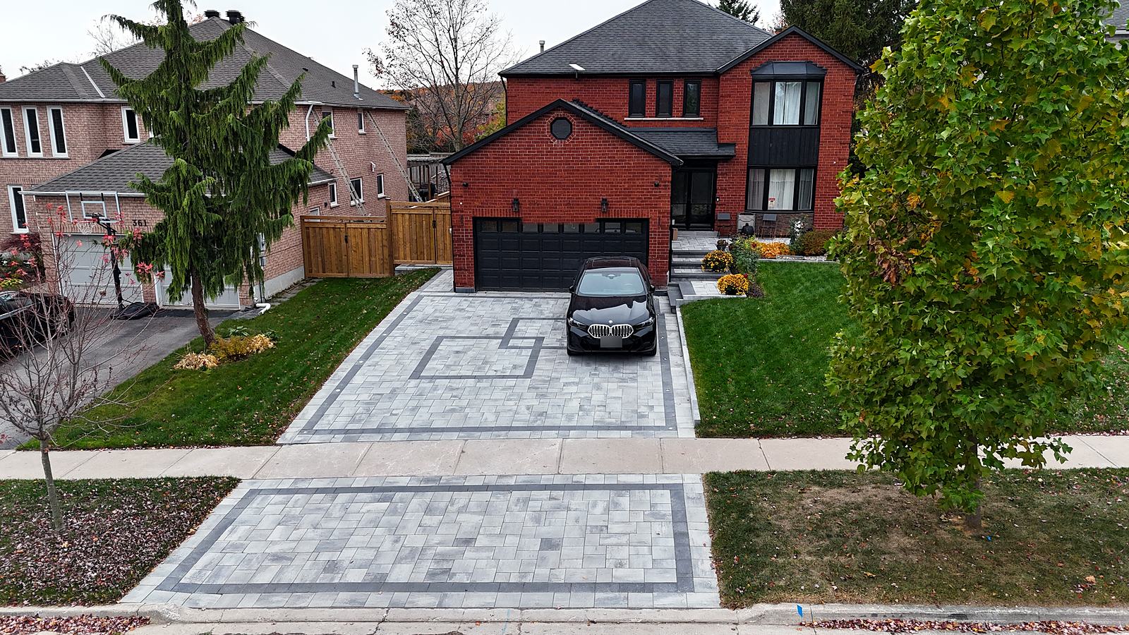 The same Newmarket home from above on an autumn afternoon